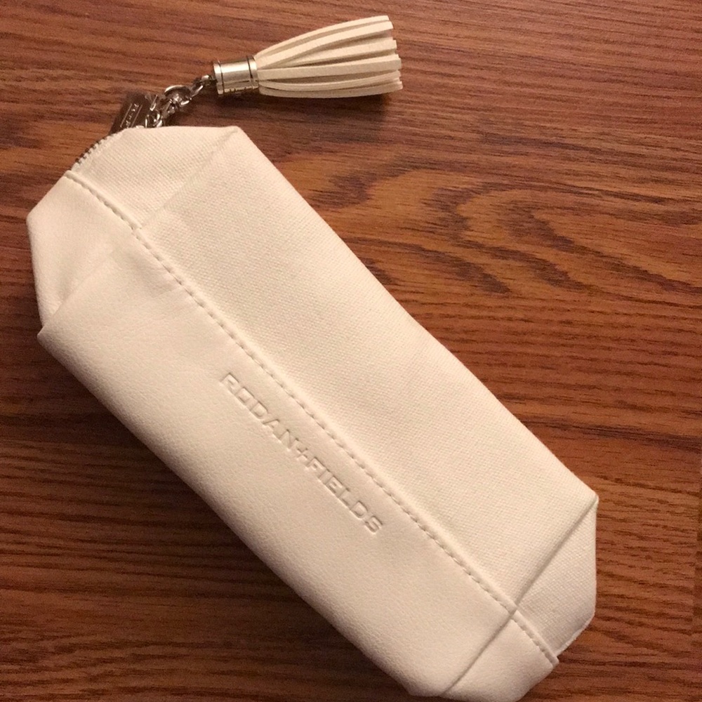 Brand new Rodan + Fields cosmetic pouch